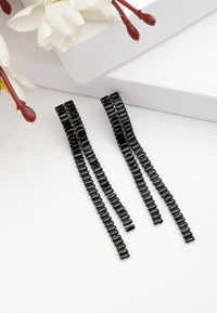 Boucles d'oreilles pendantes asymétriques Diva