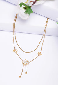 Collier à double rangée de pompons floraux