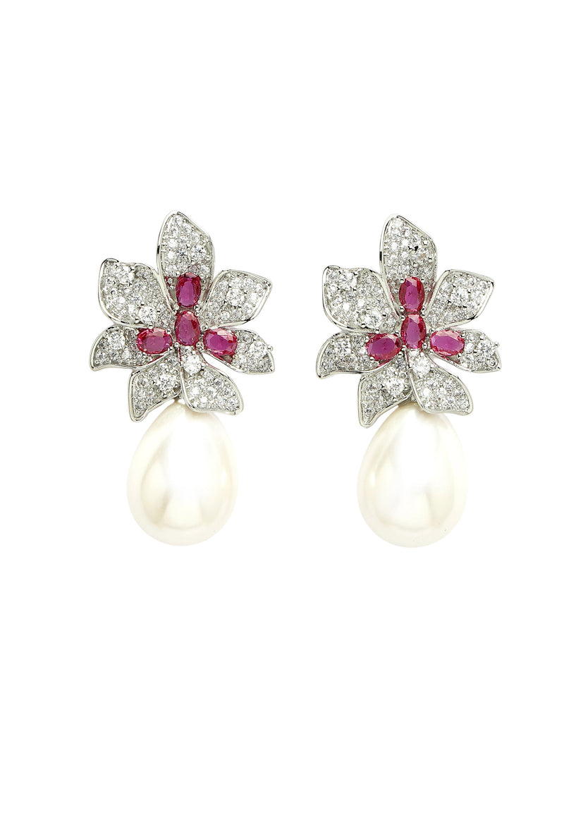 Boucles d'oreilles pendantes florales en zircone