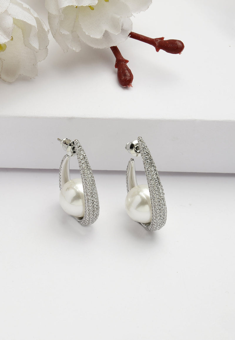 Boucles d'oreilles iconiques Sling Pearl