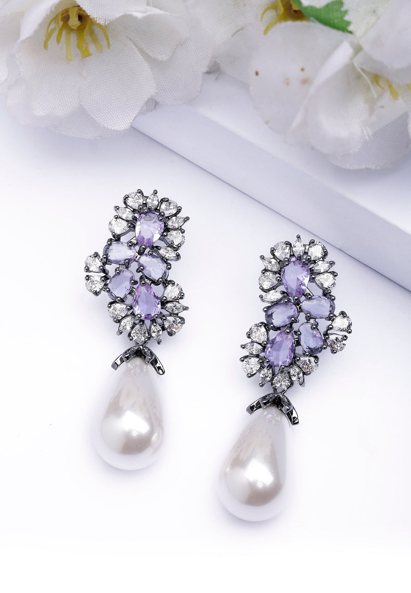 Boucles d'oreilles pendantes élégantes en perle violette