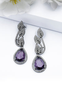Boucles d'oreilles violettes contemporaines en forme de feuille