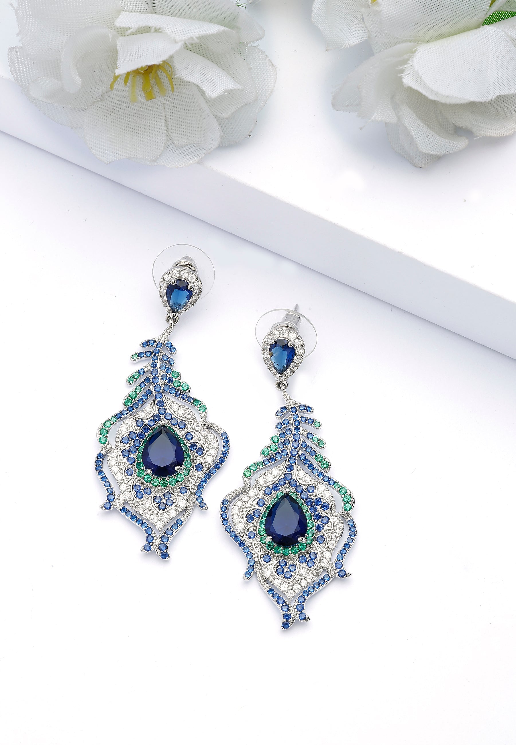 Boucles d'oreilles en plumes de paon bleu foncé