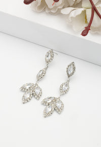 Boucles d'oreilles pendantes à motif de feuilles scintillantes
